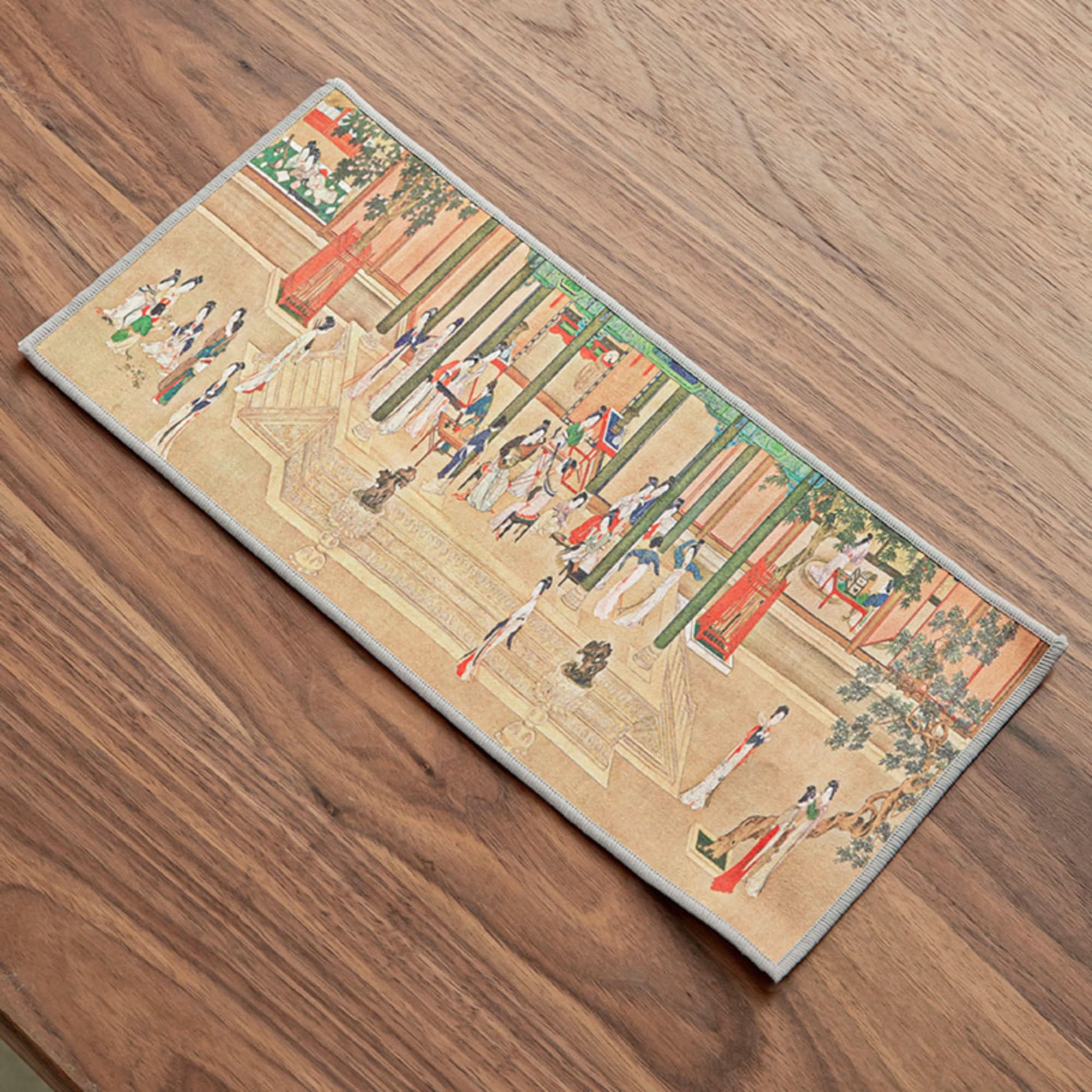 Japanese tea towels with Ukiyo-e style artwork, featuring women in traditional dress on a wooden surface.